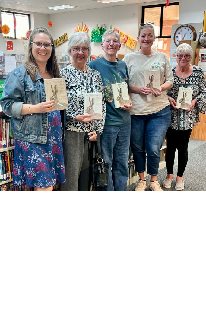 Women holding books.