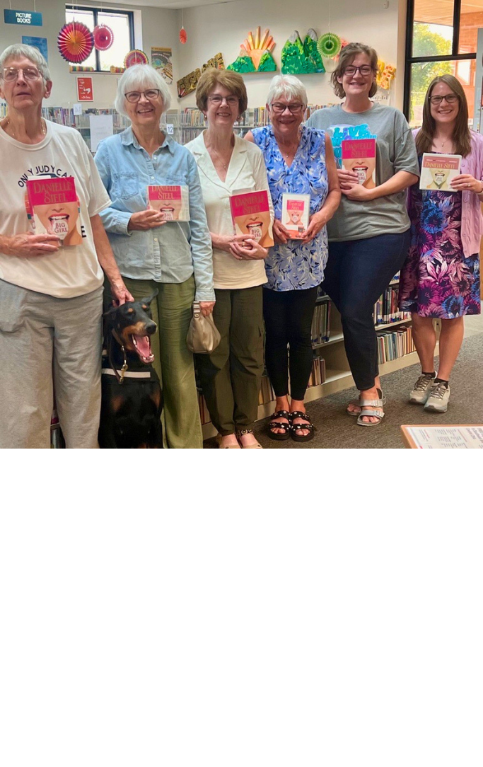 Women holding books.