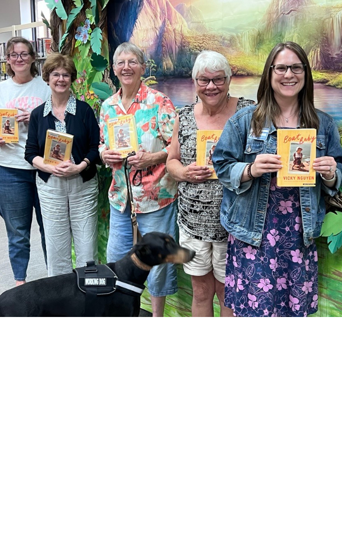 Women holding books.